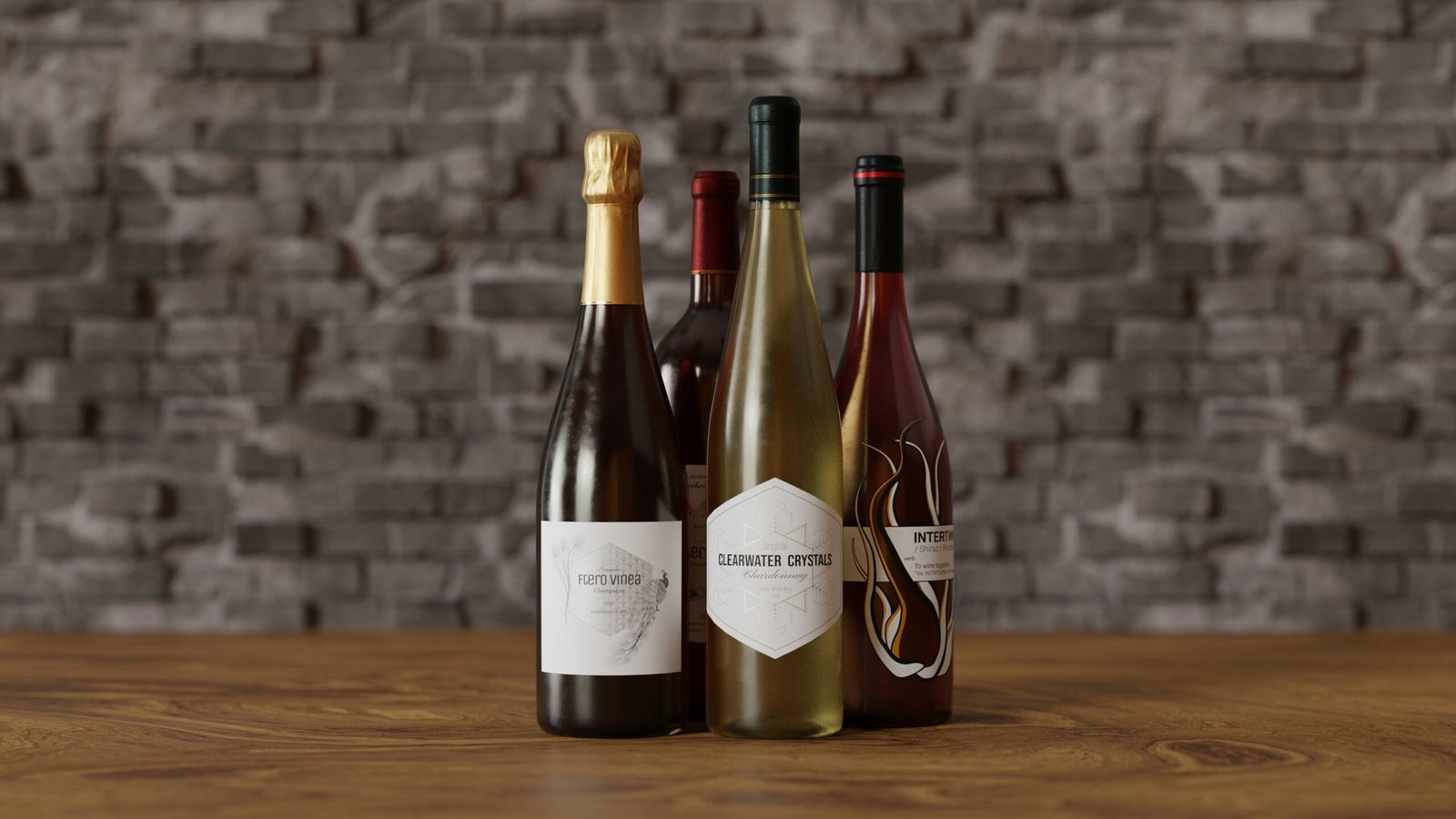 Four wine and sparkling wine bottles standing on a wooden surface against a backdrop of a rustic grey brick wall. The bottles include a gold-foiled sparkling wine, a dark red wine bottle partially obscured, a light green/yellowish white wine bottle with a distinctive hexagonal white label, and a deep red wine bottle with a stylized label.